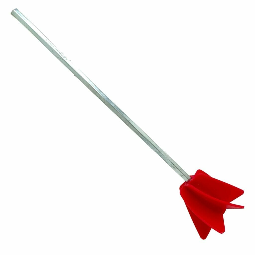 A red plastic spatula on a white background.