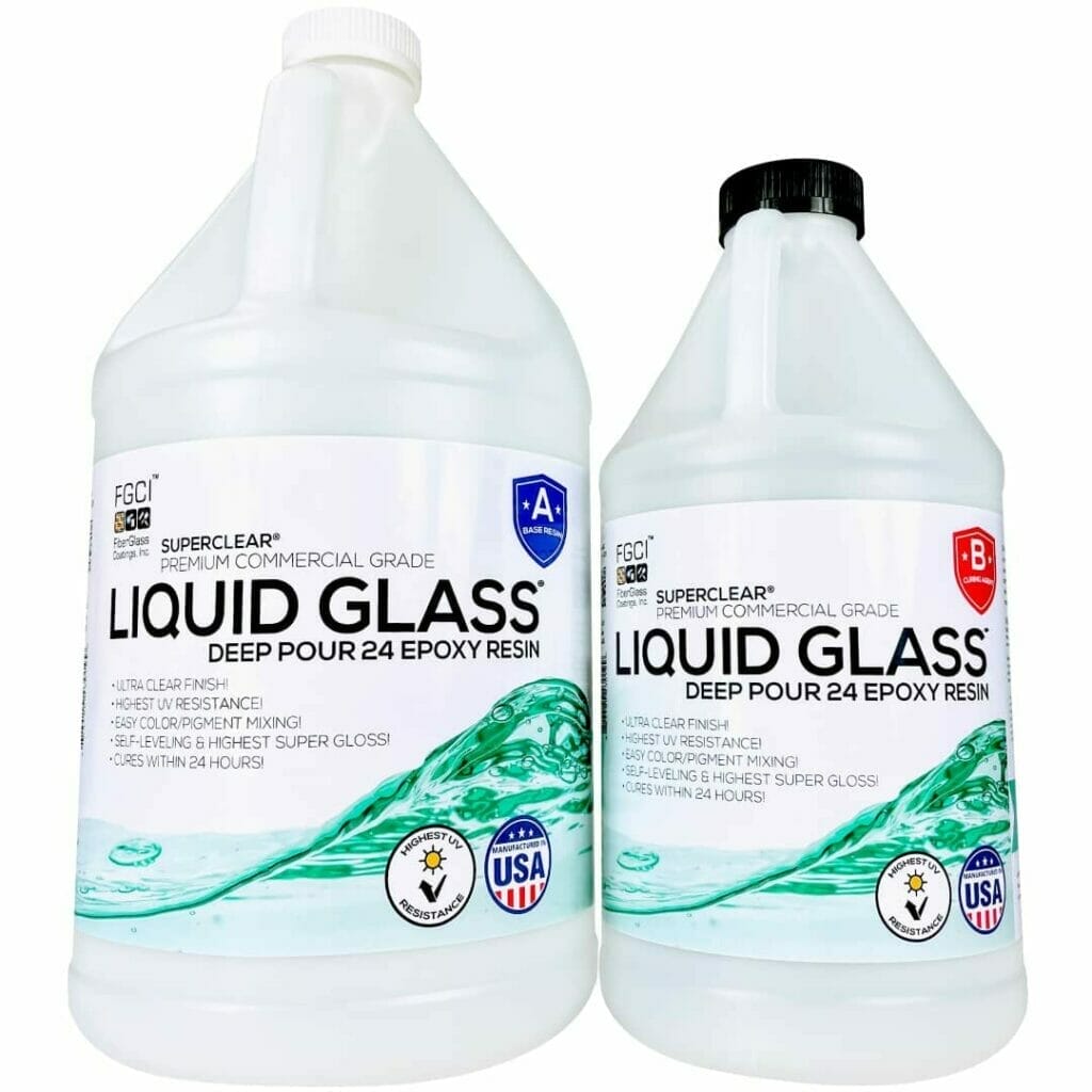 Two gallons of Liquid Glass epoxy resin on a white background.
