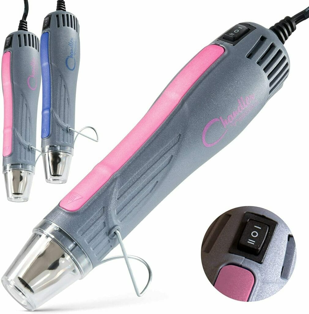 A pink and grey electric nail trimmer.