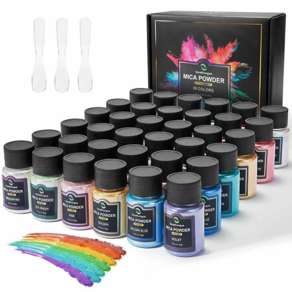 A set of paints, brushes, and Mica Powder in a box.